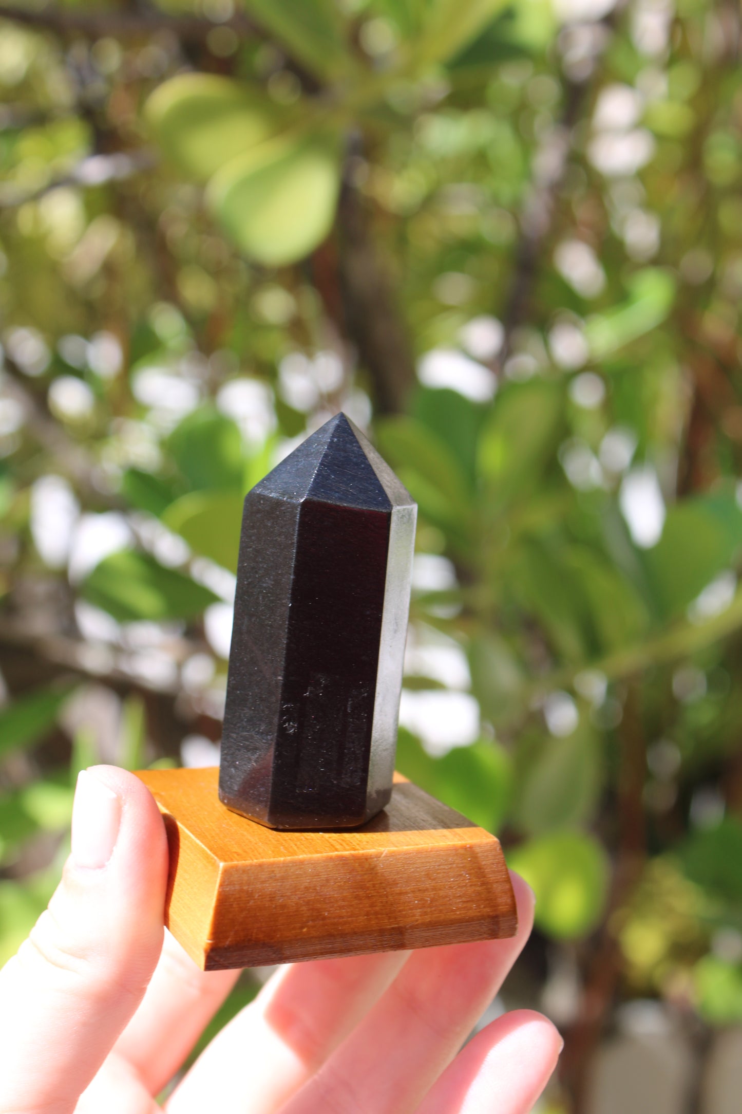 Black obsidian point crystal